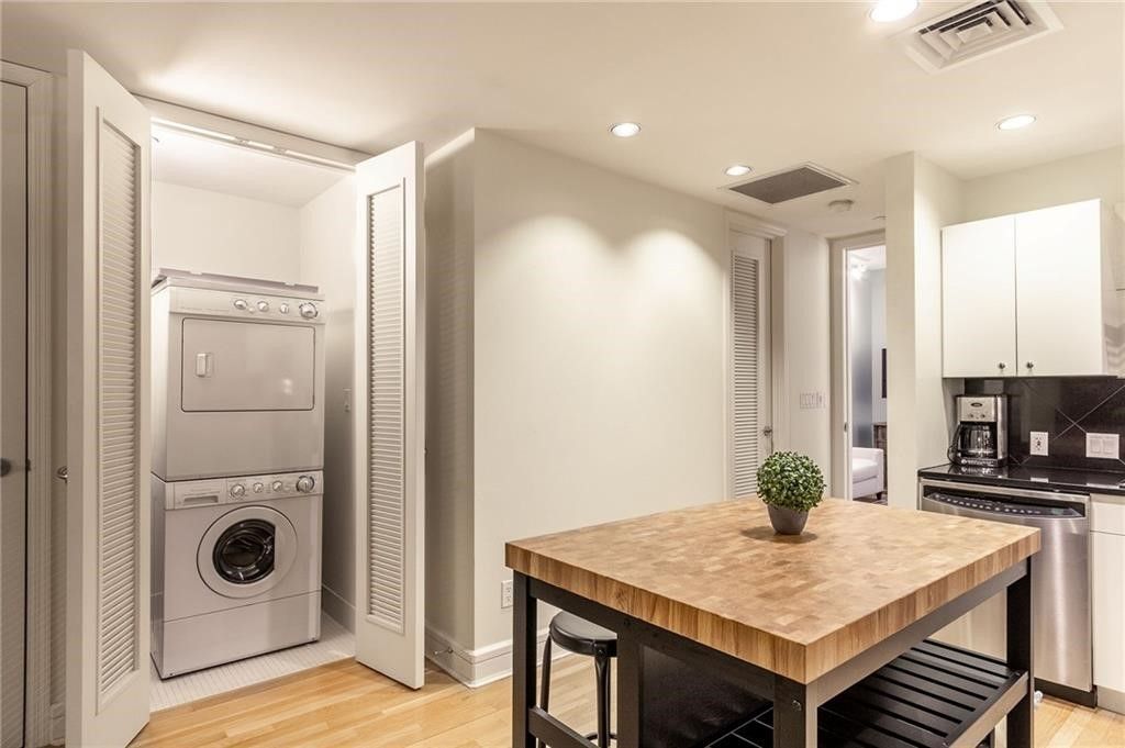 Interior, Kitchen, Recessed Lighting, Utility Closets, Washer, Wood Texture Flooring