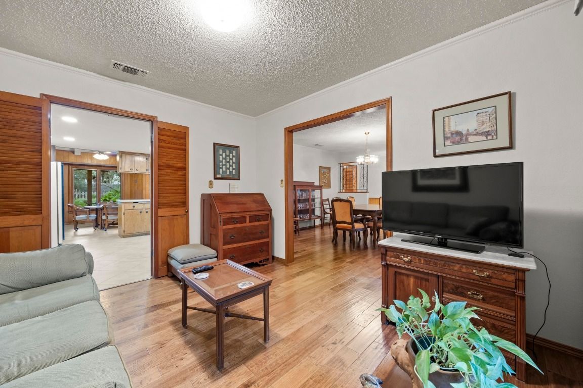 Chandelier, Dining room, Interior, Kitchen, Living room, Recessed Lighting, Wood Texture Flooring
