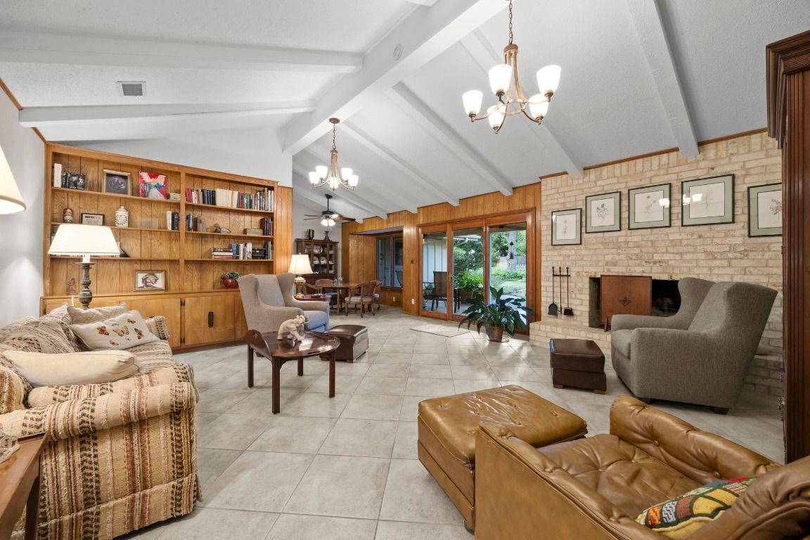 Chandelier, Fireplace, Interior, Living room, Stone Walls