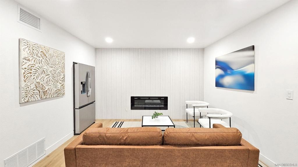 Fireplace, Interior, Living room, Recessed Lighting, Wood Texture Flooring