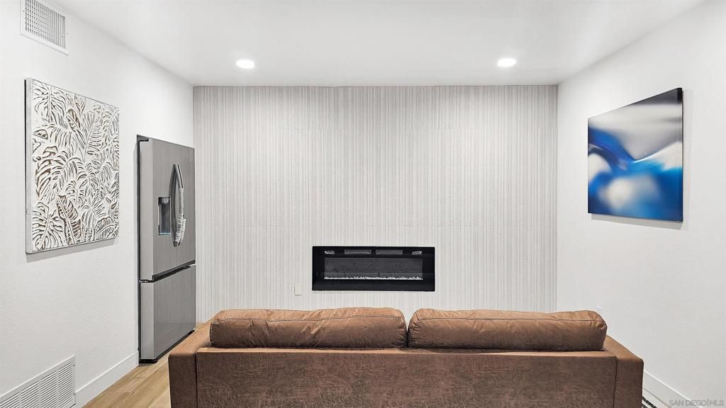 Fireplace, Interior, Living room, Recessed Lighting, Wood Texture Flooring