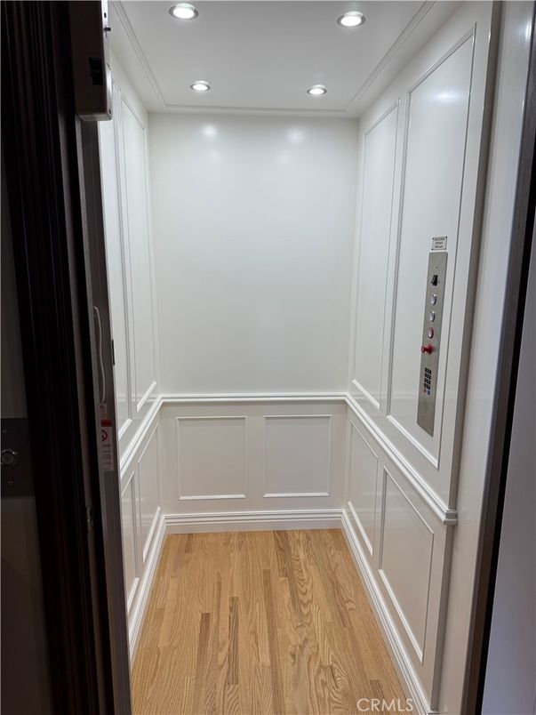Elevator, Interior, Recessed Lighting, Wood Texture Flooring