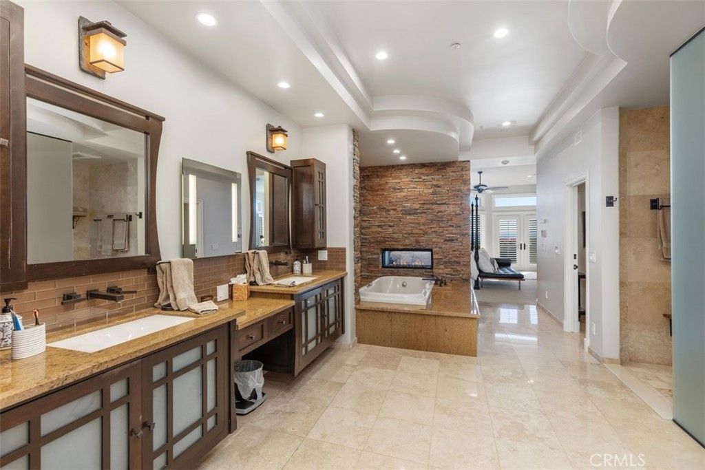 Bathroom, Dual Sink Vanities, Fireplace, Interior, Recessed Lighting, Stone Walls