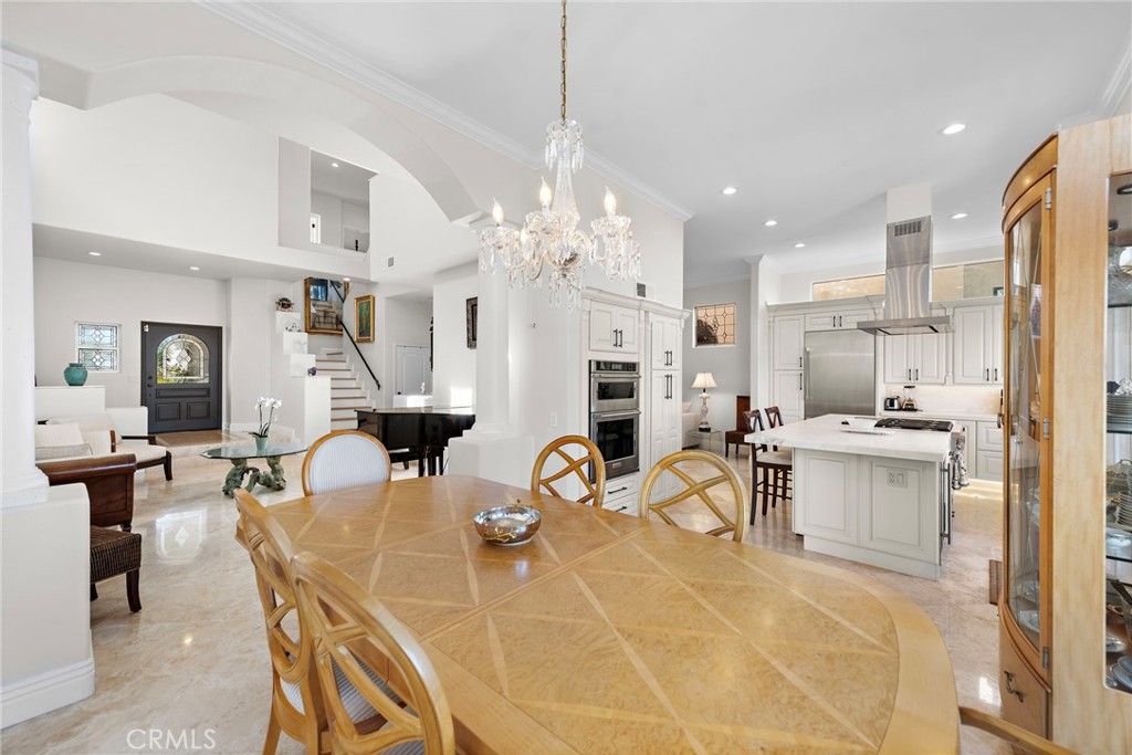 Chandelier, Dining room, Interior, Kitchen, Living room, Piano, Recessed Lighting, Stainless Steel Appliances