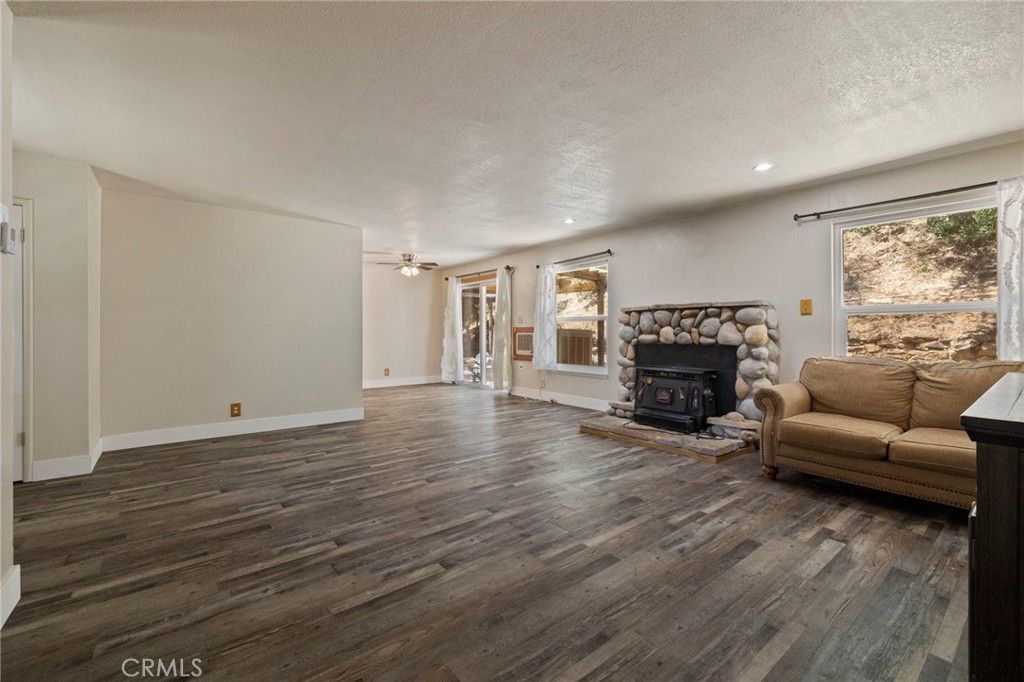 Empty room, Fireplace, Interior, Recessed Lighting, Wood Texture Flooring
