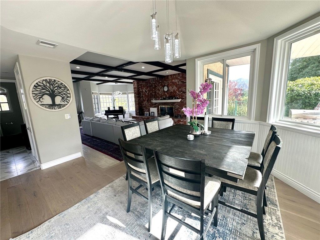 Dining room, Fireplace, Interior, Living room, Pendant Lights, Recessed Lighting, Stone Walls, Wood Texture Flooring