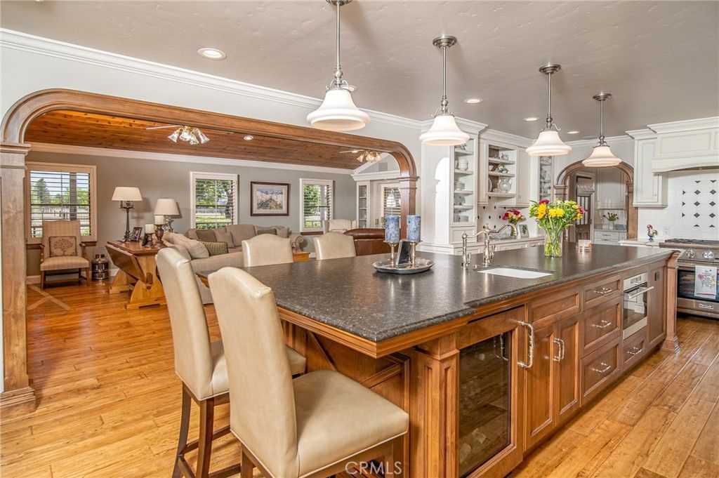 Dining room, Interior, Kitchen, Living room, Pendant Lights, Recessed Lighting, Stainless Steel Appliances, Wood Texture Flooring