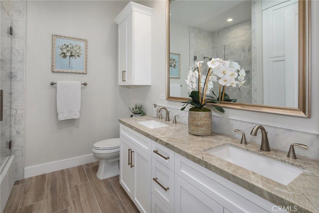 Bathroom, Dual Sink Vanities, Interior, Recessed Lighting, Wood Texture Flooring