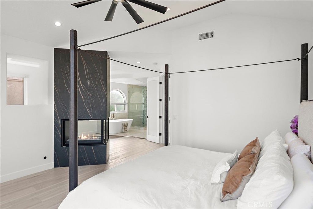 Bedroom, Fireplace, Interior, Recessed Lighting, Wood Texture Flooring