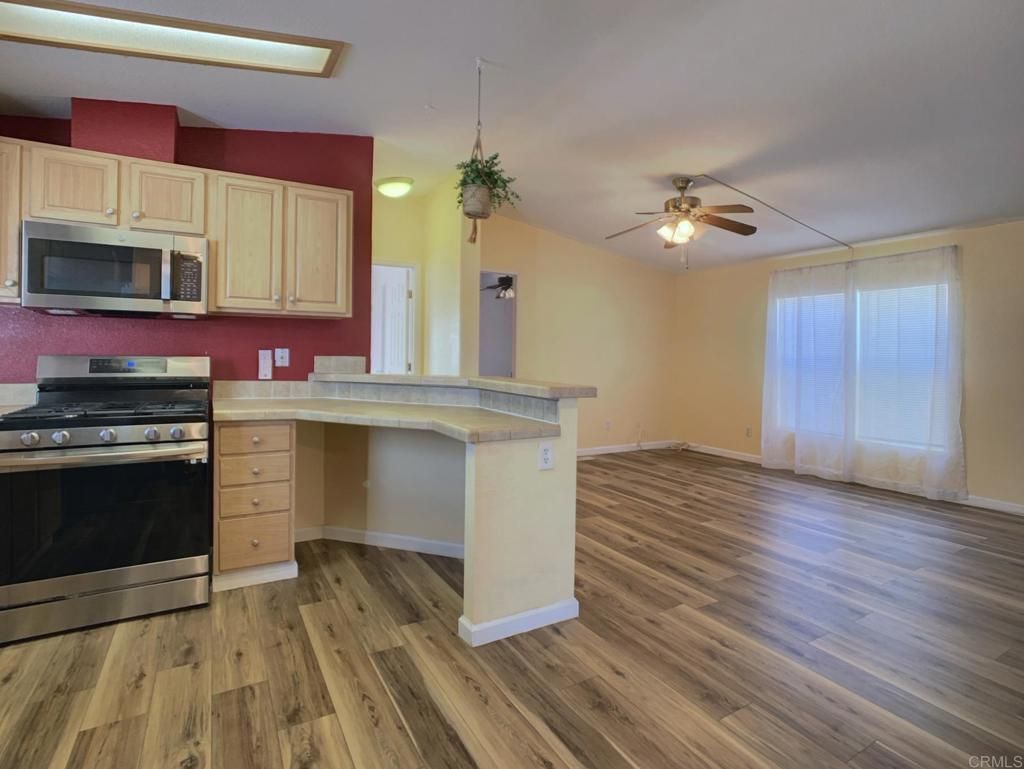 Interior, Kitchen, Pendant Lights, Stainless Steel Appliances, Wood Texture Flooring