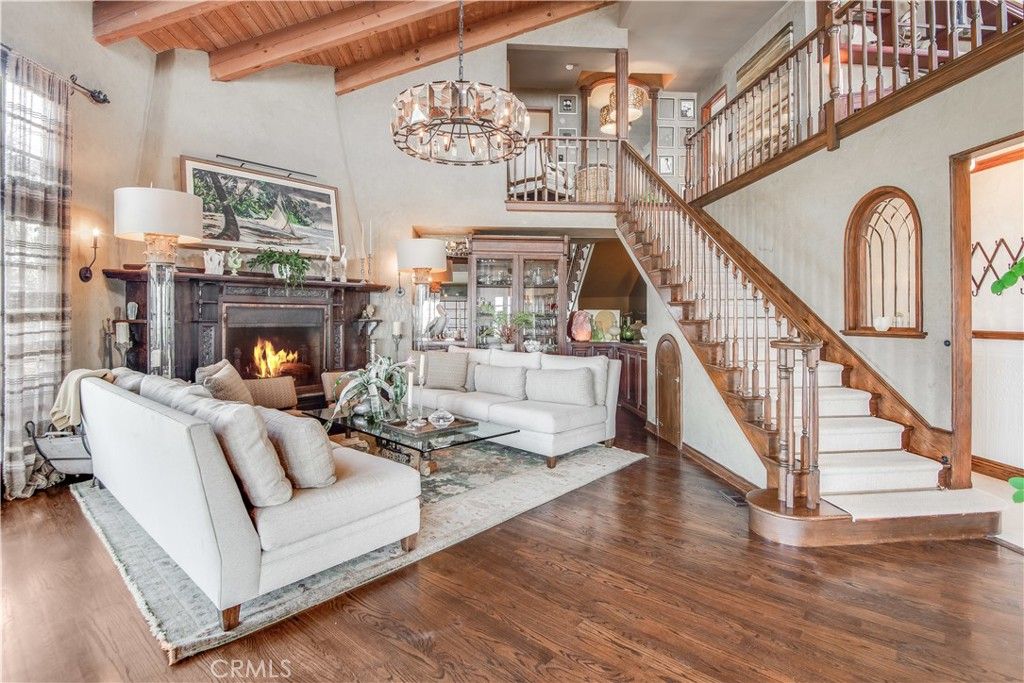 Chandelier, Fireplace, Interior, Living room, Recessed Lighting, Wooden Beams, Wooden Ceilings, Wood Texture Flooring
