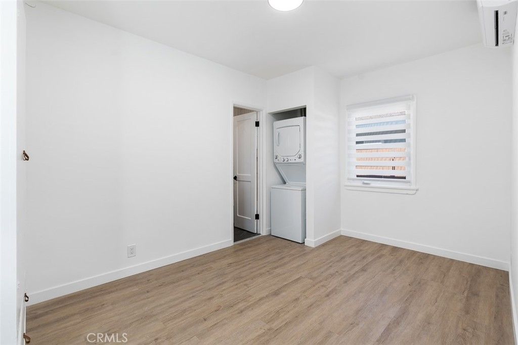 Empty room, Interior, Utility Closets, Washer, Wood Texture Flooring