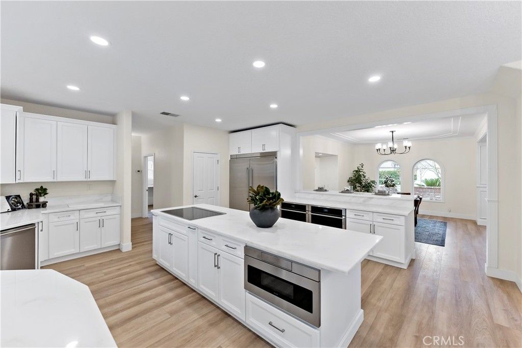 Chandelier, Interior, Kitchen, Recessed Lighting, Stainless Steel Appliances, Wood Texture Flooring