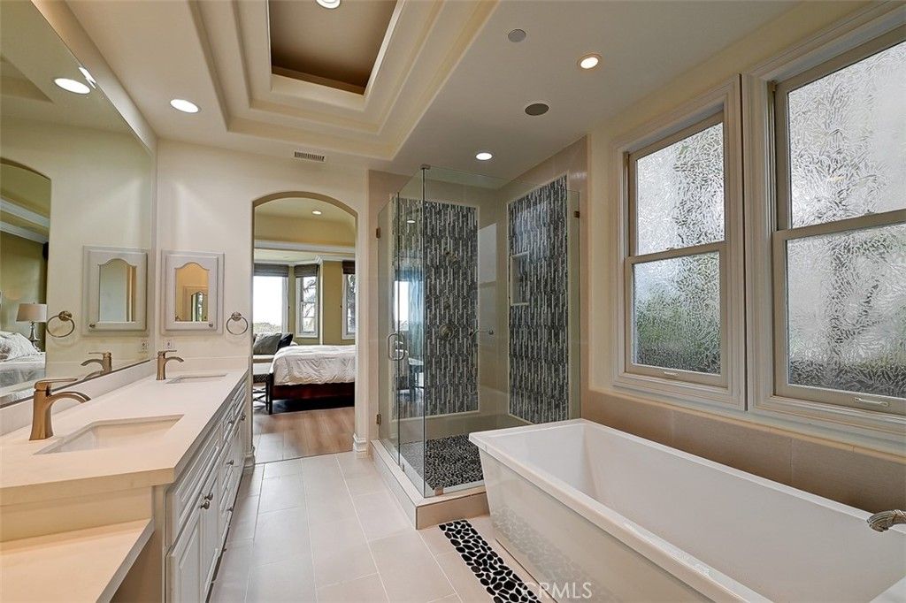 Bathroom, Bedroom, Dual Sink Vanities, Glass Shower, Interior, Recessed Lighting, Wood Texture Flooring