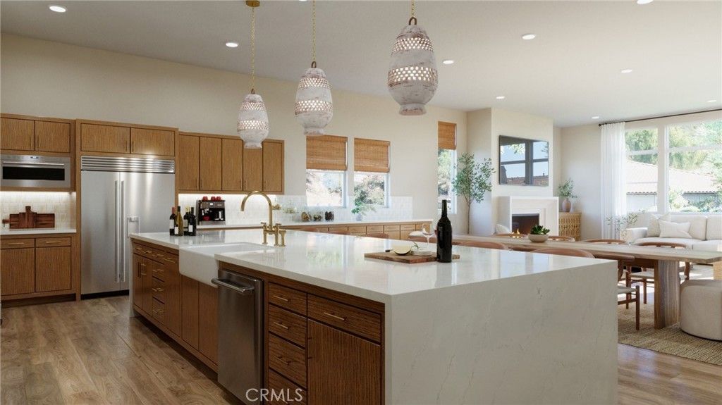 Dining room, Fireplace, Interior, Kitchen, Pendant Lights, Recessed Lighting, Stainless Steel Appliances, Wood Texture Flooring