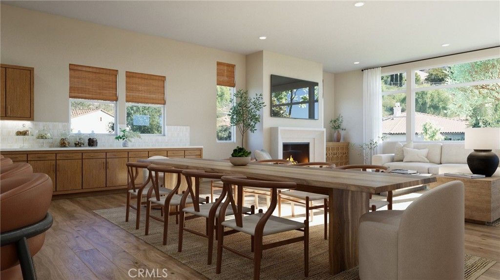 Dining room, Fireplace, Interior, Living room, Recessed Lighting, Wood Texture Flooring