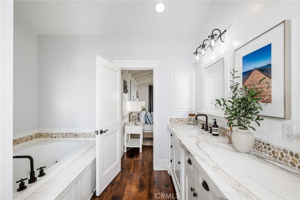 Bathroom, Dual Sink Vanities, Interior, Recessed Lighting, Wood Texture Flooring