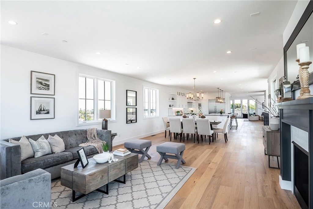Dining room, Fireplace, Interior, Living room, Pendant Lights, Recessed Lighting, Wood Texture Flooring