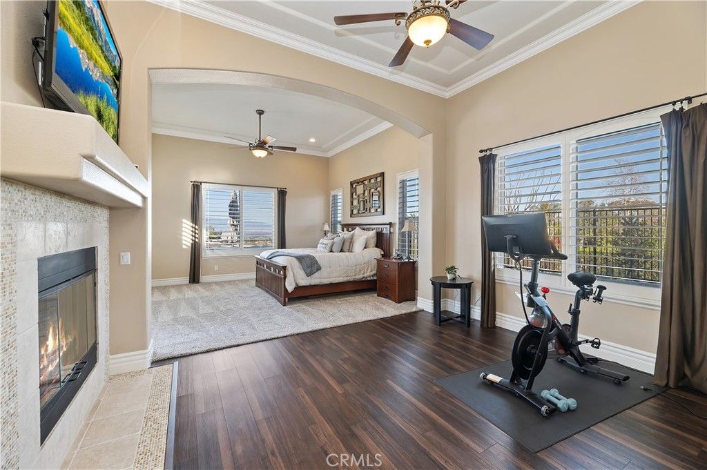 Bedroom, Fireplace, Fitness Equipment, Interior, Recessed Lighting, Wood Texture Flooring