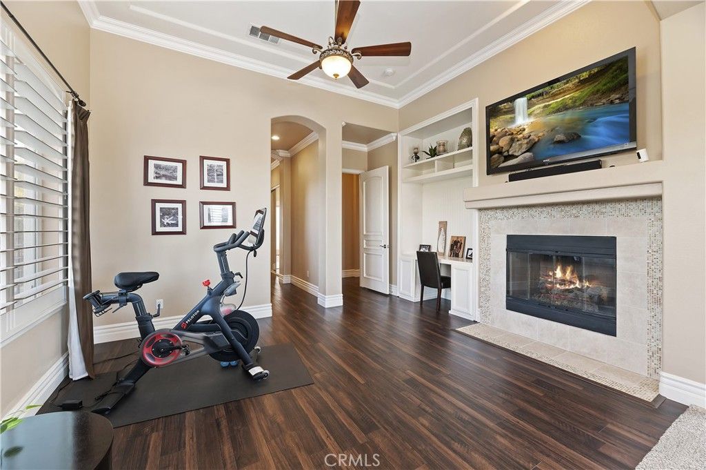 Fireplace, Fitness Equipment, Interior, Recessed Lighting, Wood Texture Flooring