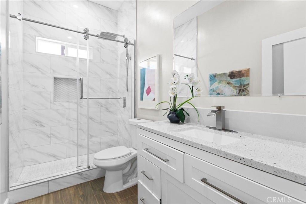 Bathroom, Glass Shower, Interior, Marble Walls, Wood Texture Flooring
