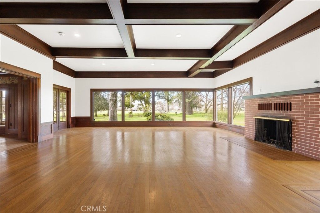 Empty room, Fireplace, Interior, Recessed Lighting, Stone Walls, Wooden Beams, Wood Texture Flooring