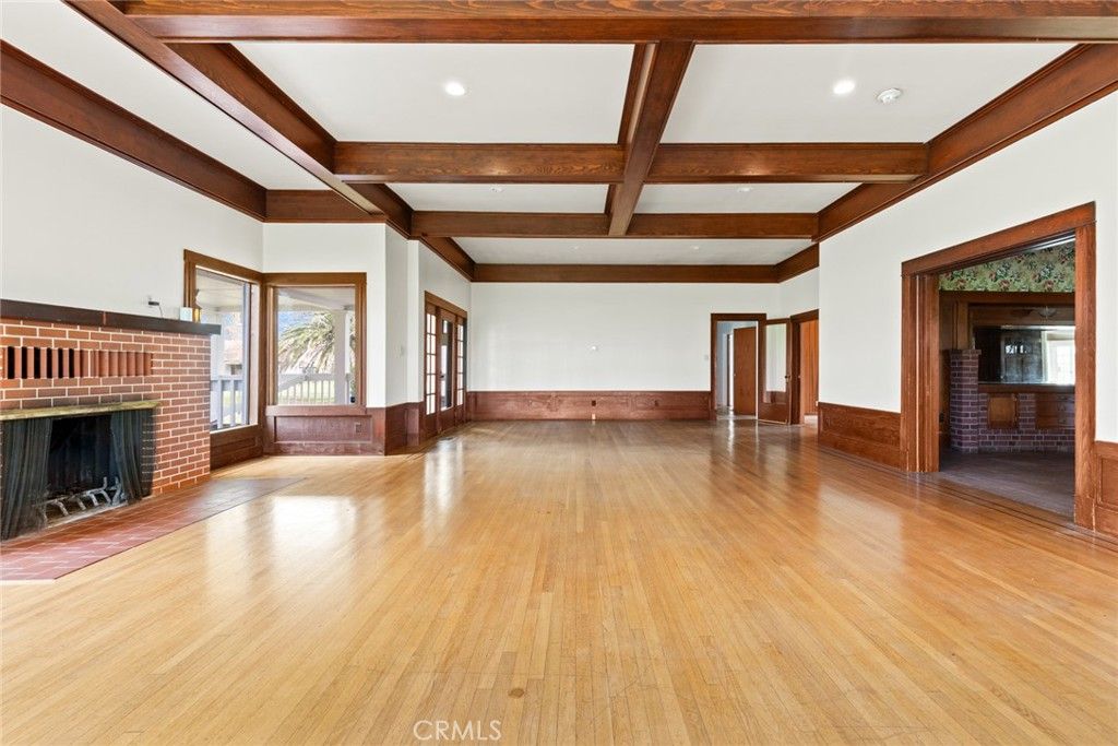 Empty room, Fireplace, Interior, Recessed Lighting, Stone Walls, Wooden Beams, Wood Texture Flooring