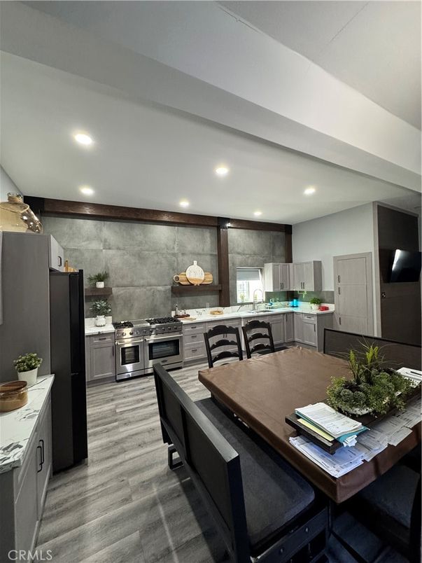 Dining room, Interior, Kitchen, Recessed Lighting, Stainless Steel Appliances, Wood Texture Flooring