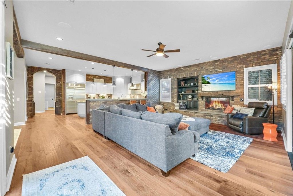 Fireplace, Interior, Kitchen, Living room, Pendant Lights, Recessed Lighting, Stone Walls, Wooden Beams, Wood Texture Flooring