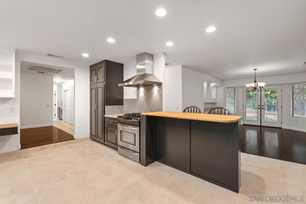 Chandelier, Interior, Kitchen, Recessed Lighting, Stainless Steel Appliances, Wood Texture Flooring