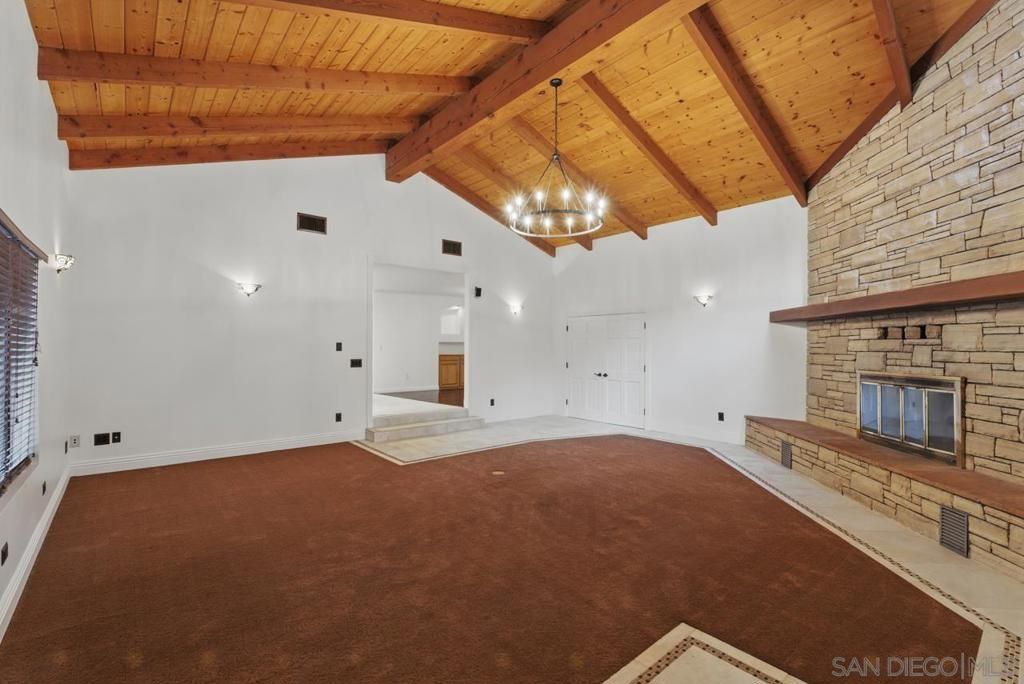 Empty room, Fireplace, Interior, Pendant Lights, Wooden Beams, Wooden Ceilings