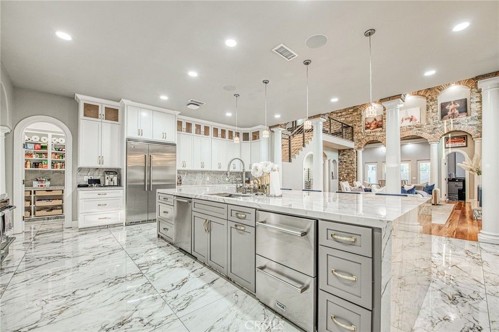Interior, Kitchen, Marble, Pendant Lights, Recessed Lighting, Stainless Steel Appliances, Stone Walls