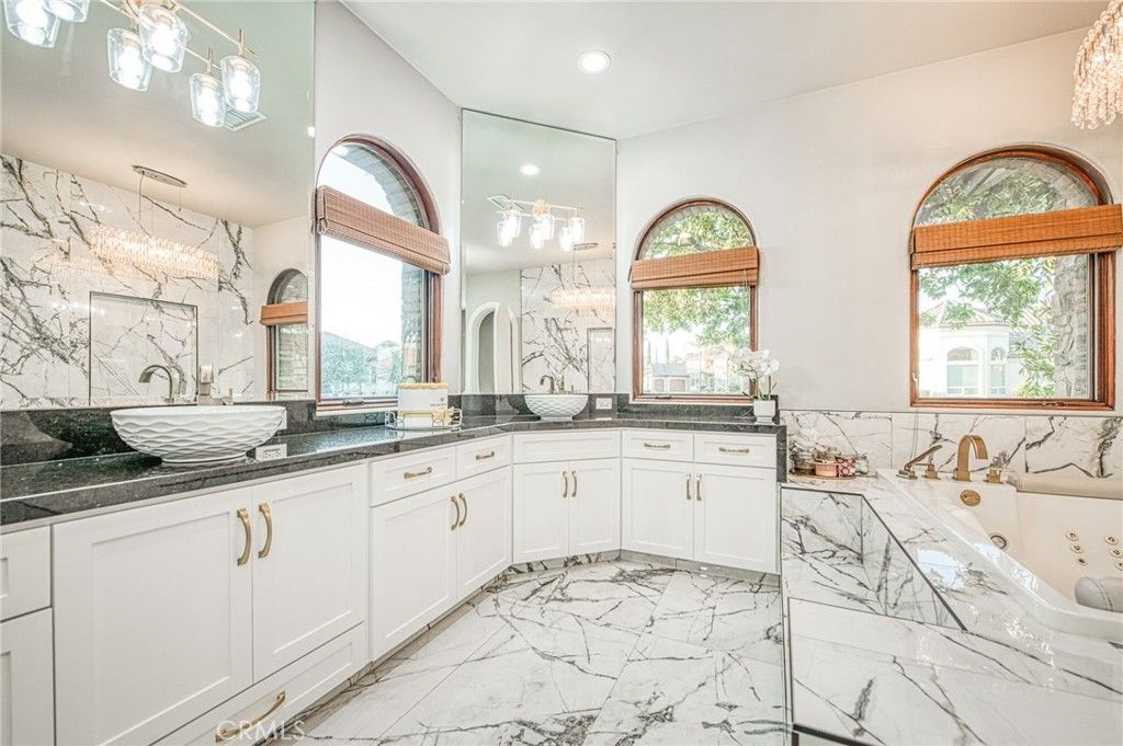 Bathroom, Dual Sink Vanities, Interior, Marble, Marble Walls, Recessed Lighting