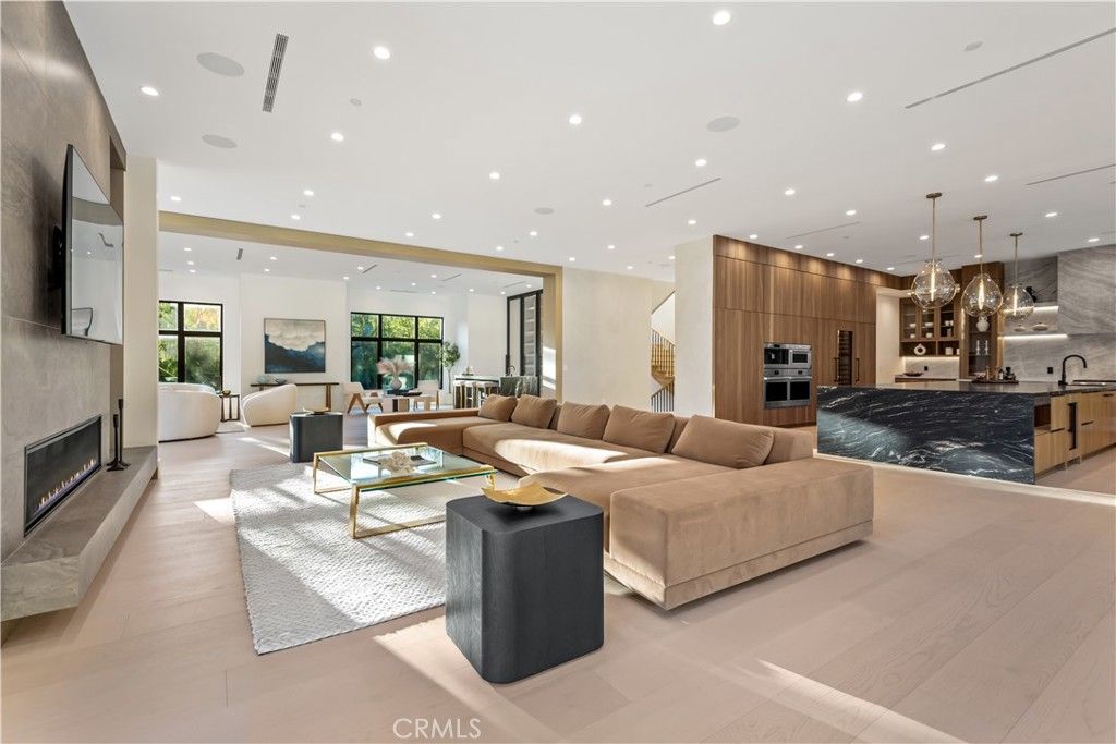 Fireplace, Interior, Kitchen, Living room, Pendant Lights, Recessed Lighting, Stainless Steel Appliances, Wood Texture Flooring