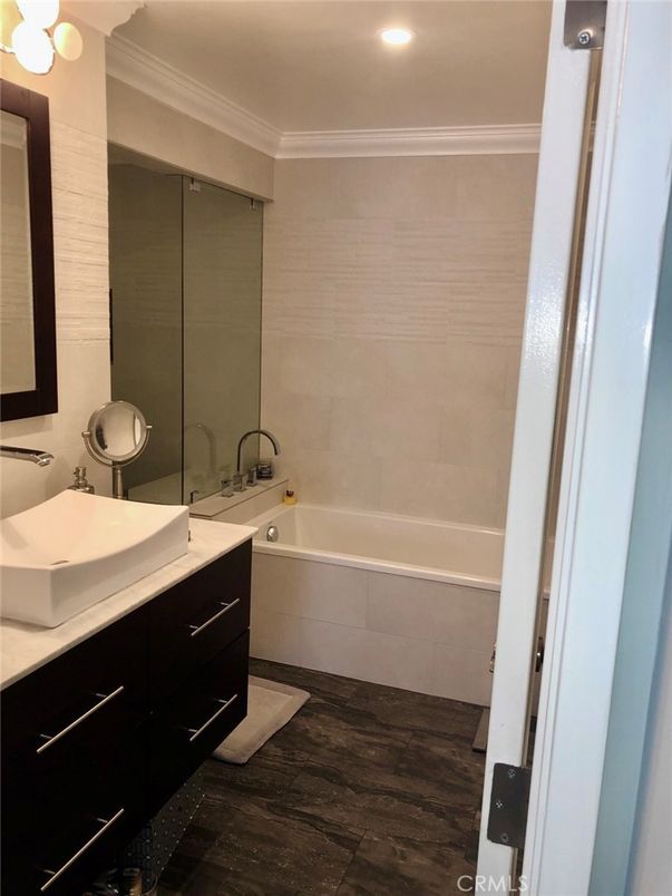 Bathroom, Dual Sink Vanities, Interior, Recessed Lighting, Wood Texture Flooring
