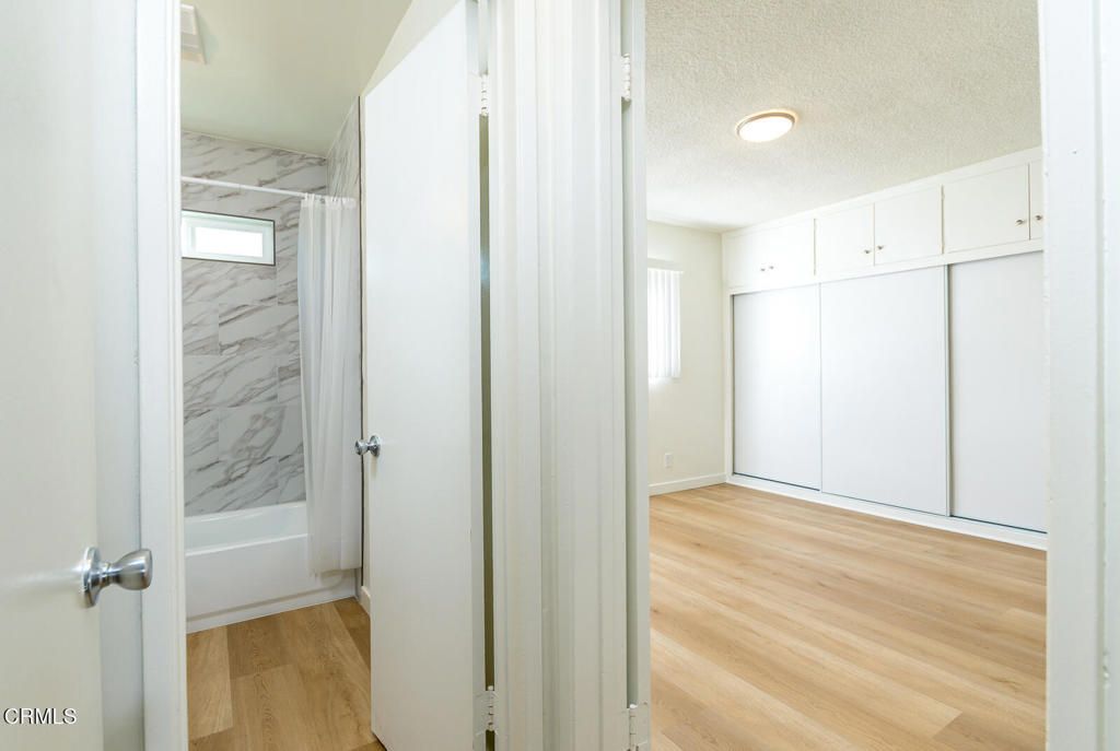 Interior, Marble Walls, Recessed Lighting, Wood Texture Flooring