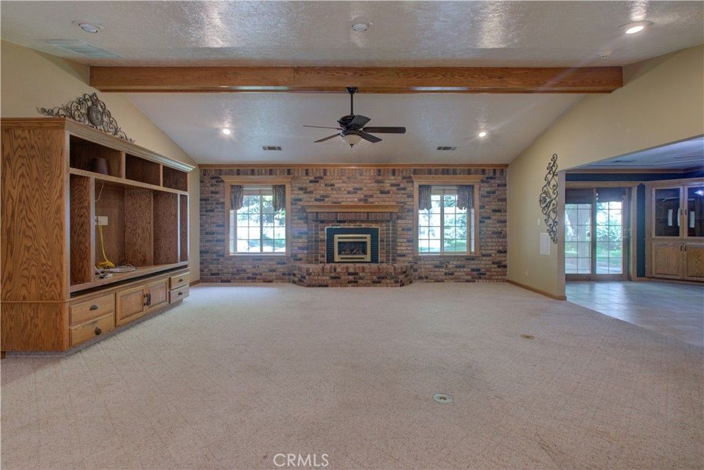 Empty room, Fireplace, Interior, Recessed Lighting, Stone Walls, Wooden Beams