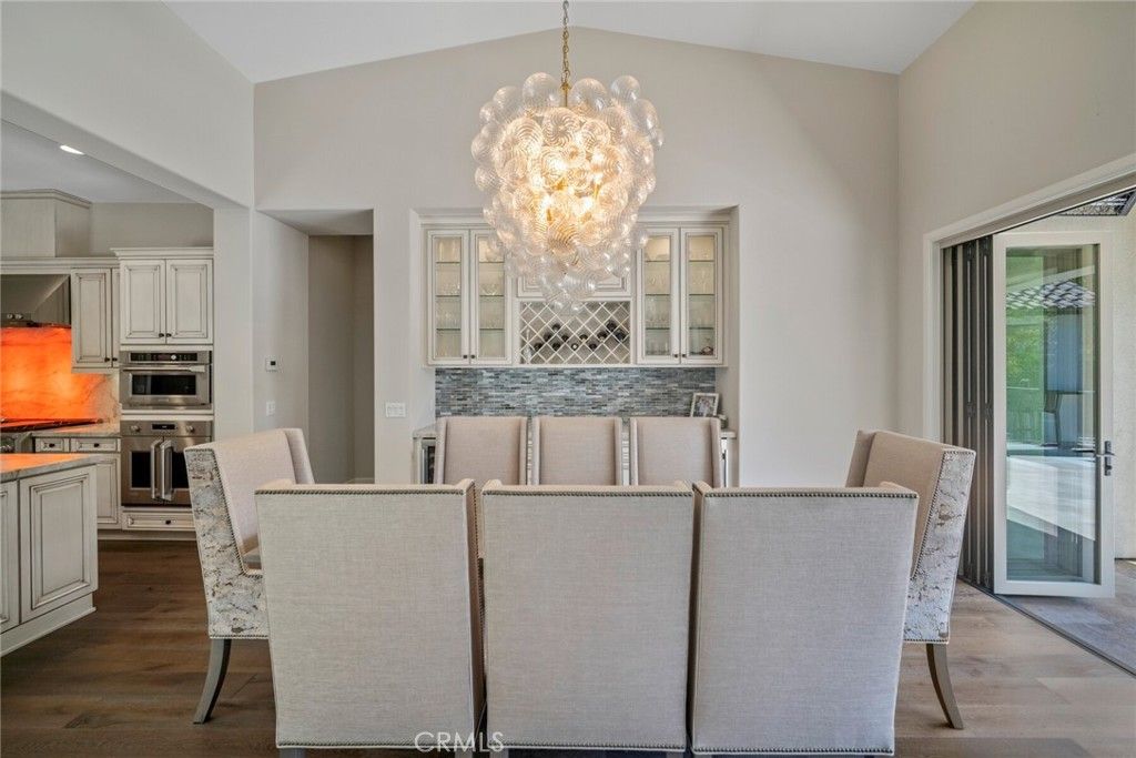 Chandelier, Dining room, Interior, Kitchen, Stainless Steel Appliances, Wood Texture Flooring