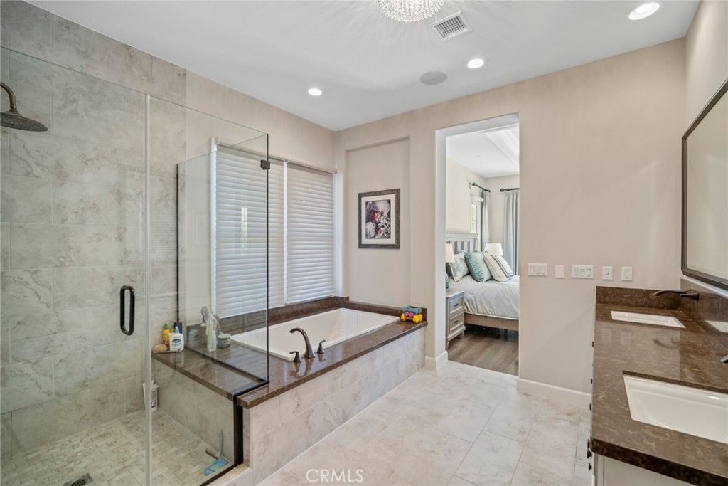Bathroom, Bedroom, Dual Sink Vanities, Glass Shower, Interior, Recessed Lighting, Wood Texture Flooring