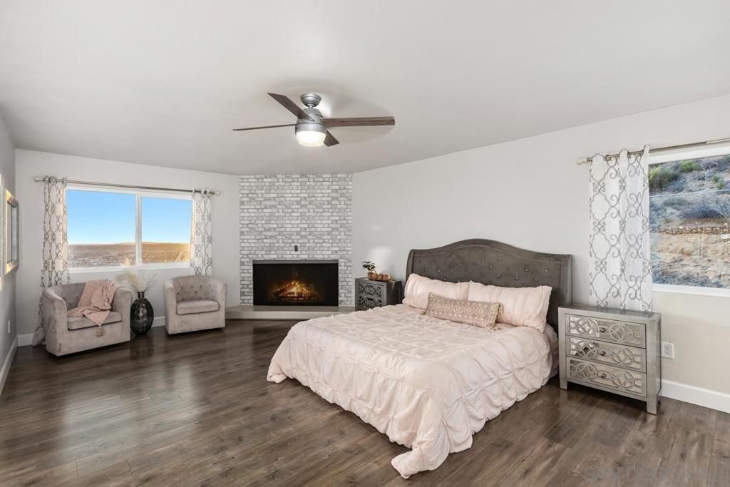 Bedroom, Fireplace, Interior, Stone Walls, Wood Texture Flooring