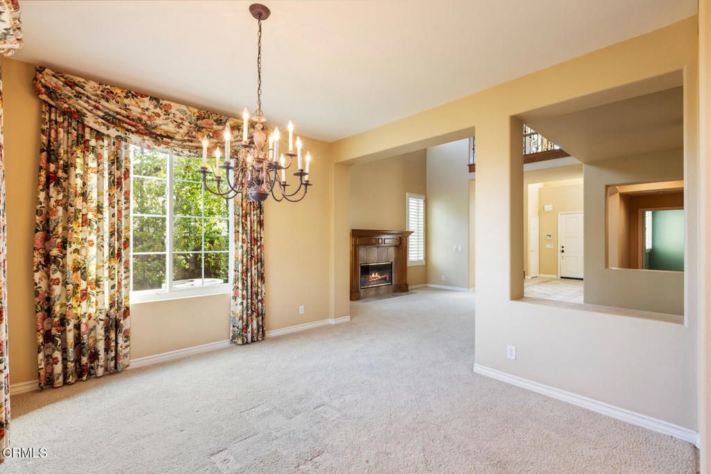 Chandelier, Empty room, Fireplace, Interior