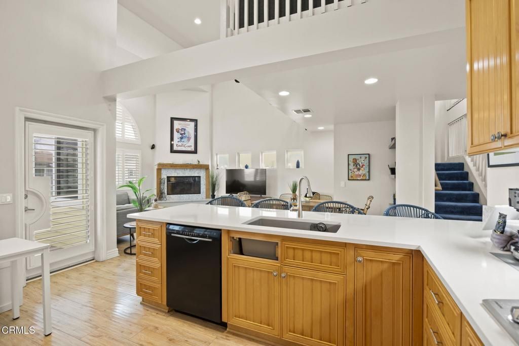 Dining room, Fireplace, Interior, Kitchen, Recessed Lighting, Wood Texture Flooring
