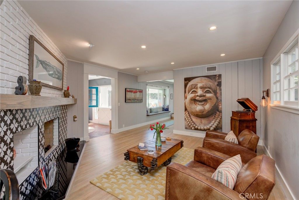 Fireplace, Interior, Living room, Piano, Recessed Lighting, Stone Walls, Wood Texture Flooring