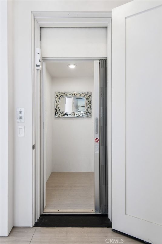 Elevator, Interior, Recessed Lighting, Wood Texture Flooring