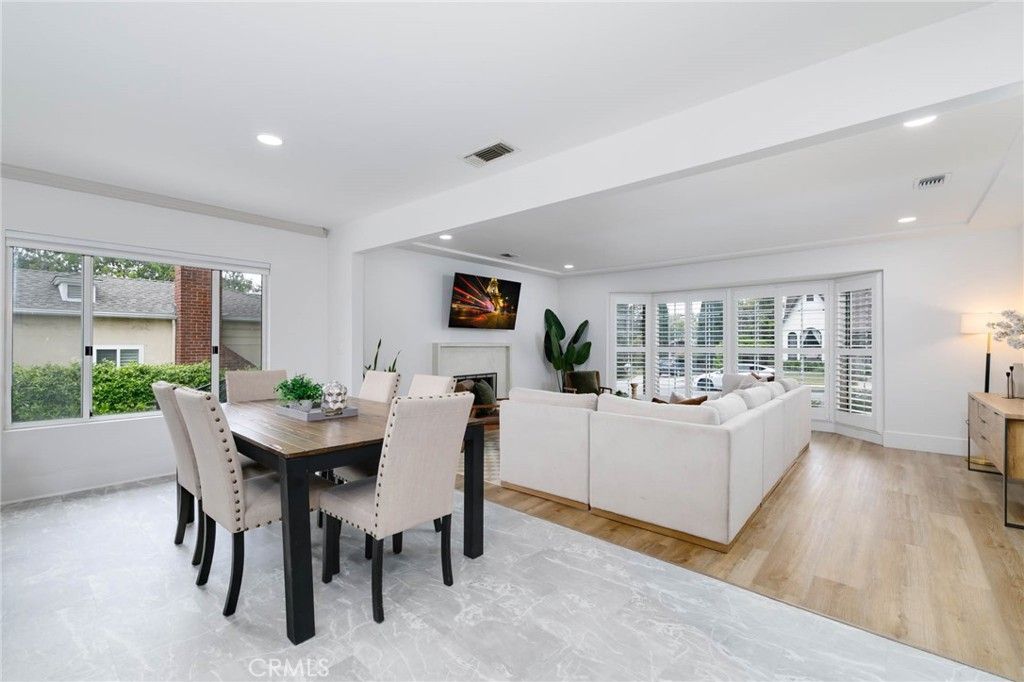 Dining room, Fireplace, Interior, Living room, Recessed Lighting, Wood Texture Flooring