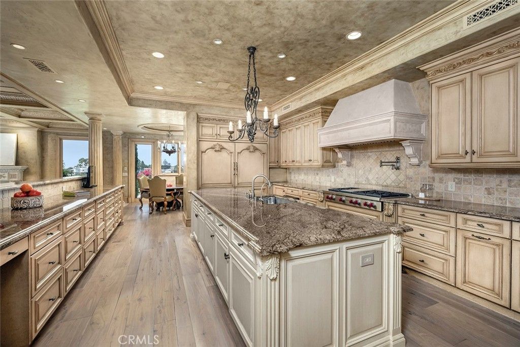 Chandelier, Dining room, Interior, Kitchen, Recessed Lighting, Stainless Steel Appliances, Wood Texture Flooring
