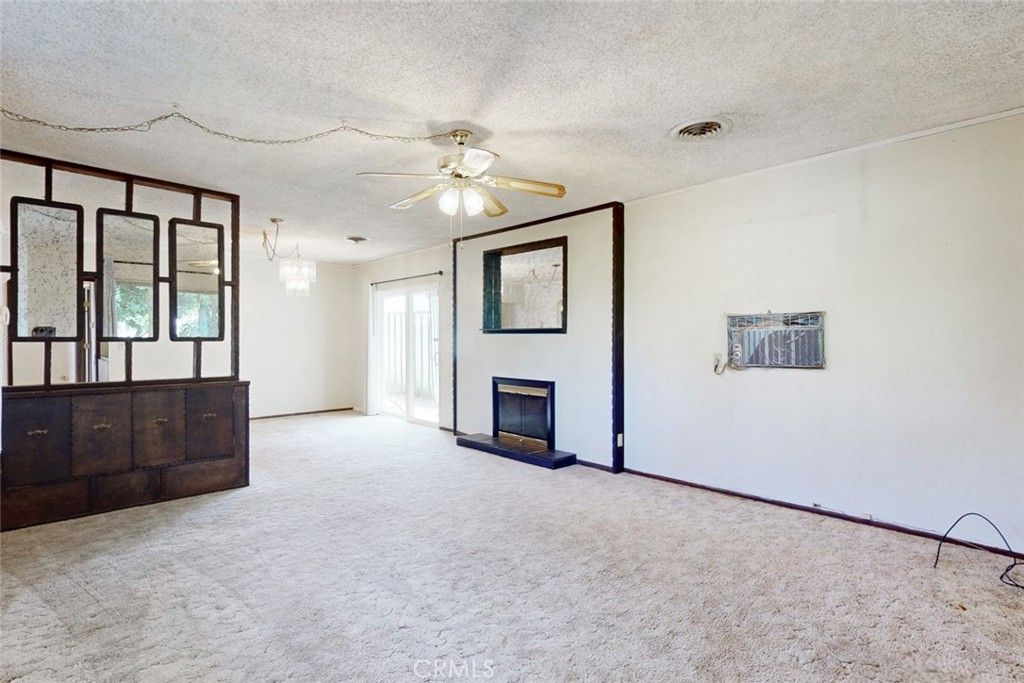 Chandelier, Empty room, Fireplace, Interior