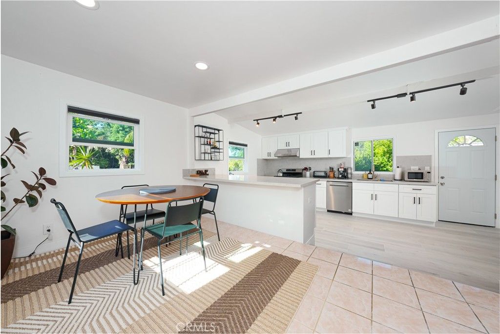 Dining room, Interior, Kitchen, Recessed Lighting, Stainless Steel Appliances, Wood Texture Flooring