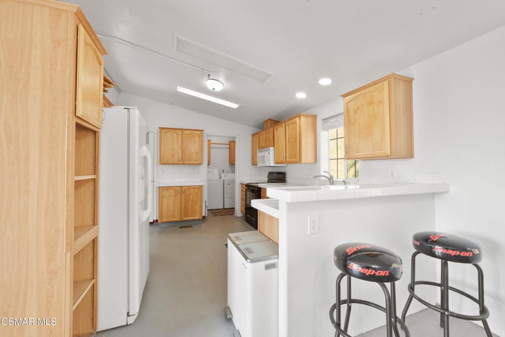 Interior, Kitchen, Recessed Lighting, Tile Countertops, Washer