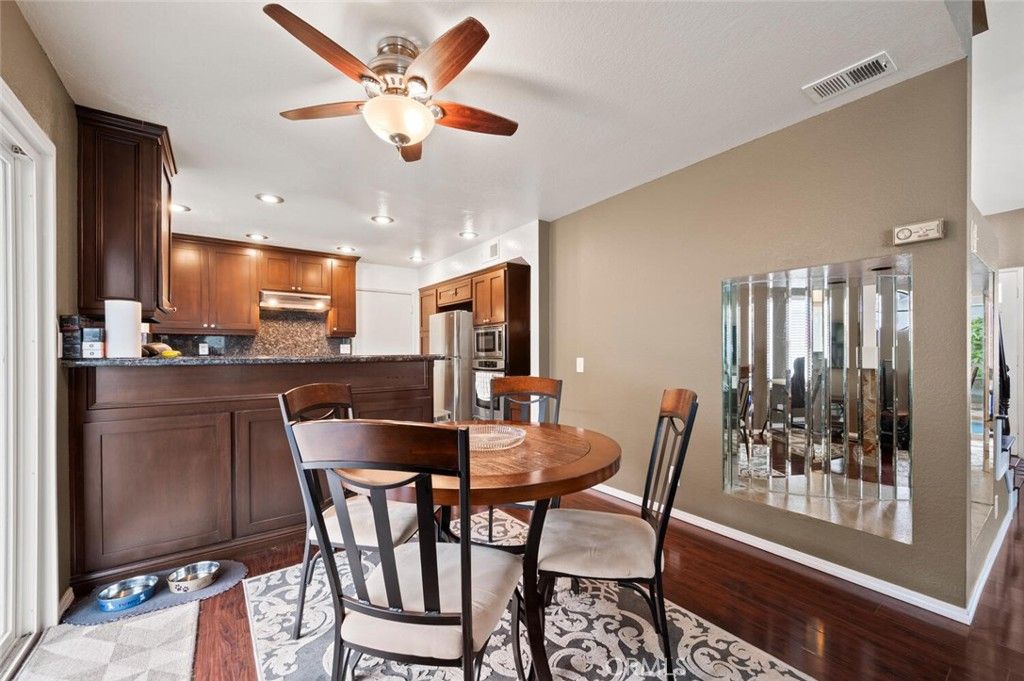 Dining room, Interior, Kitchen, Recessed Lighting, Stainless Steel Appliances, Wood Texture Flooring